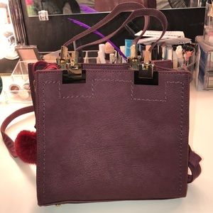 Burgundy purse with Pom Pom